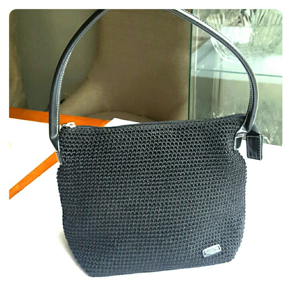 Black hand bag by -The Sak ,